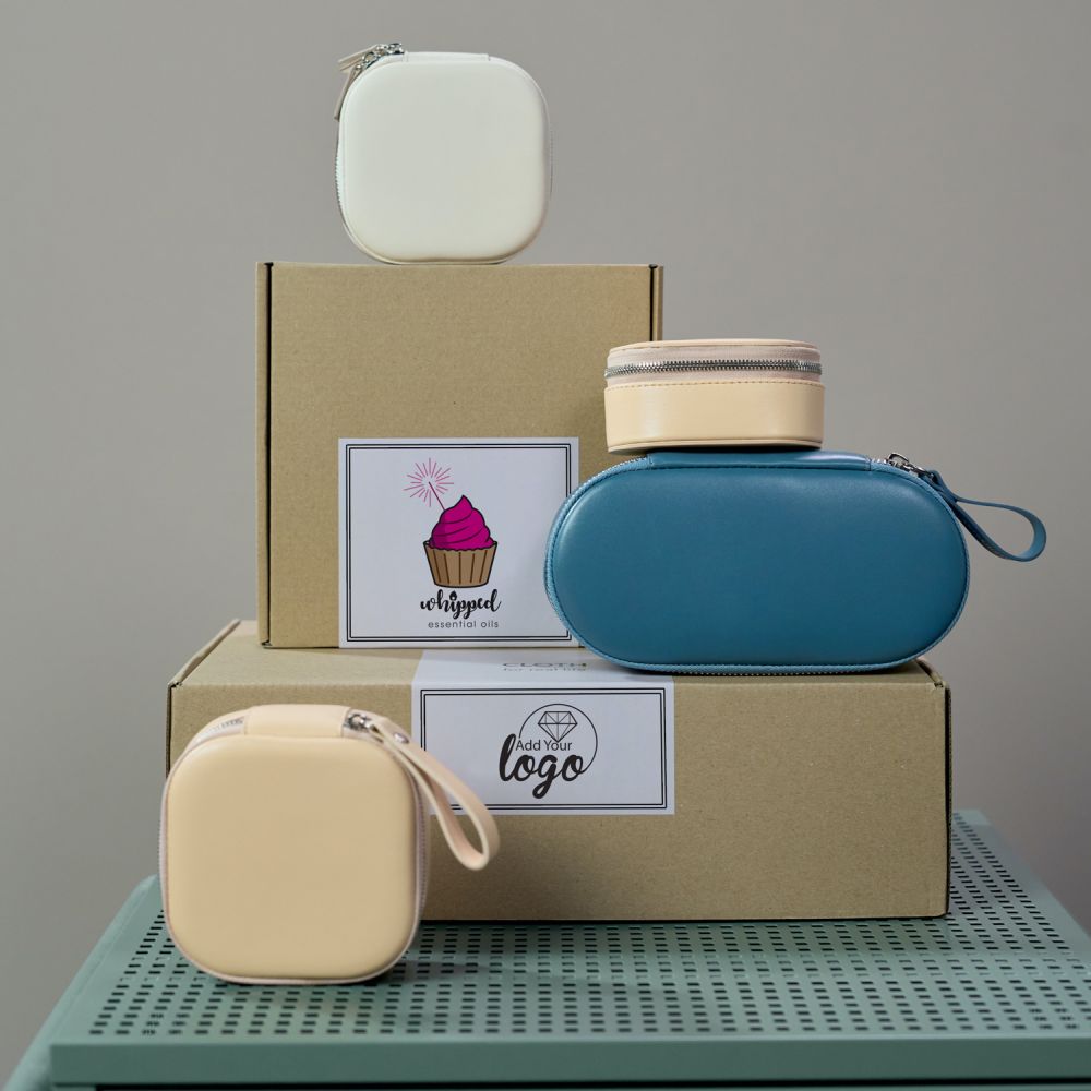 A five and a half by five and a half label is affixed to a box pyramid. One label states add your logo, the other states whipped essential oils.