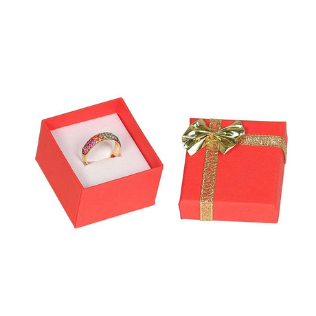 Red jewelry ring box with a gold bow tie